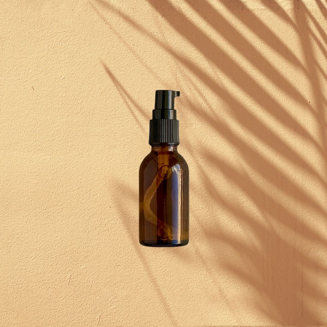 Decorative Image of Amber Bottle with treatment pump.